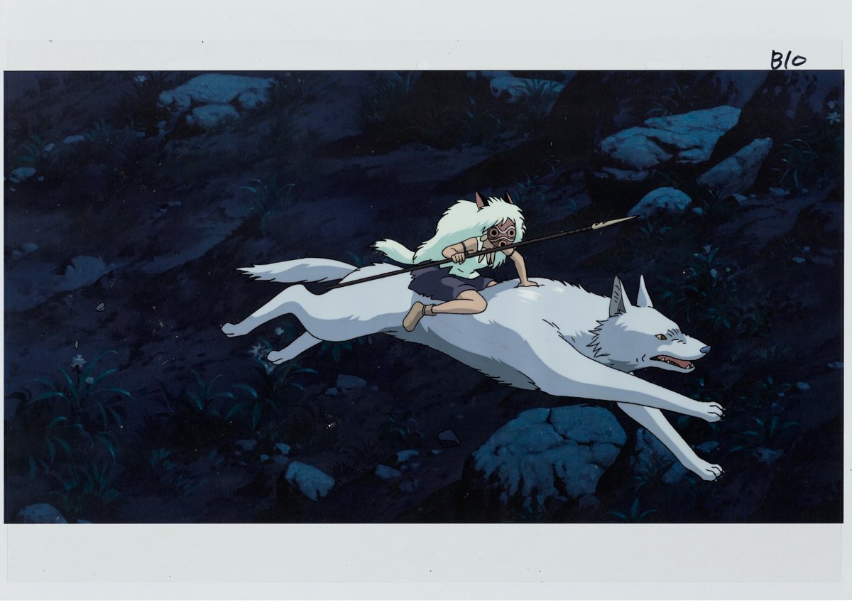 Production cel of San riding a white wolf at night from Princess Mononoke, over its painted background, with the cel label B10 in the corner